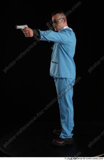 MIKAEL BLUESPY WITH TWO GUNS